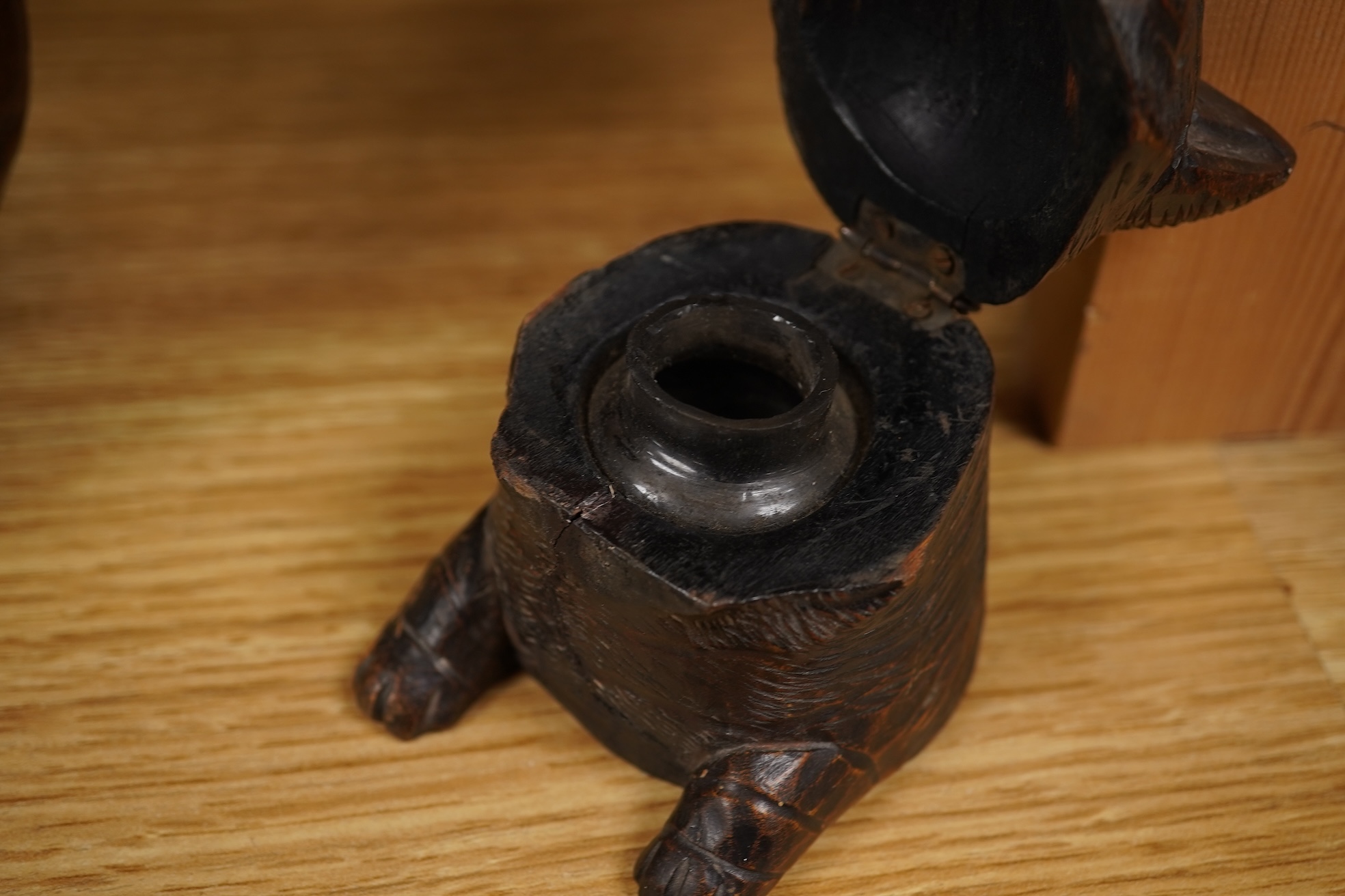 A Black Forest carving of a kitten in a boot inkwell and another car inkwell, tallest 15cm